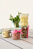 Jars containing mixes for pink risotto, mushroom and potato soup, lemon risotto and minestrone