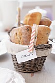 Clothes peg holding sign on bread basket