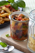 Tomato and bell pepper sauce with olives for a pasta dish