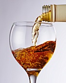 Mead being pouring into a glass