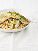 Whiting fillets with white beans and coconut