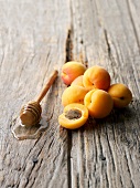 Apricots and a honey dipper