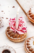 A mini Bundt cake topped with a candle