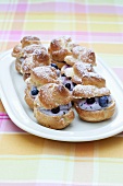 Profiteroles filled with blueberries and quark