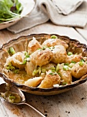 Potatoes with Fontina cheese and spring onions