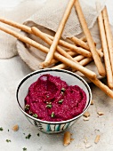 Beetroot dip with goat's cheese, thyme and grissini