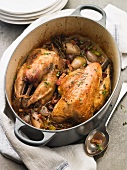 Pot-roast pheasant in a casserole dish