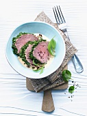 Veal fillet coated in herbs