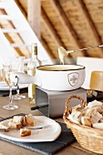 Cheese fondue with cubes of bread