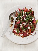 A salad of beetroot with beans and feta