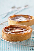 Small cheesecakes with apricot glaze