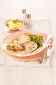 Chicken roulade with herby quark filling, served with mashed potato