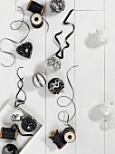 Black and white Christmas tree ornaments and decorative ribbon