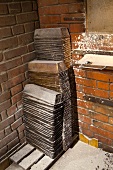 Stacked loaf tins in a bakery