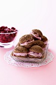 Mini chocolate cakes with raspberry cream filling