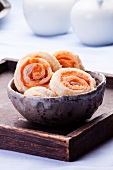 Puff pastry whirls with ham and cheese