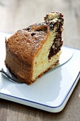 A slice of marble cake on a cake slice