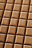 A bar of milk chocolate (filling the image)