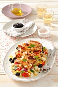 Mediterranean rice salad with fried chicken pieces