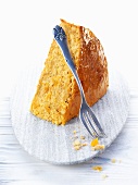 A slice of pumpkin cake with a fork