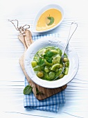 Green fruit compote with grapes and kiwis