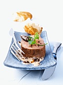 Fillet of veal with a morel sauce and chunks of baguette