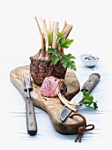 Crown of lamb on a chopping board