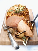 Roast pork with a mustard crust and rosemary
