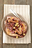 Pheasant with grapes and onions in red wine