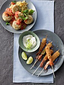 Breaded shrimp kebabs with dip and shrimp balls with tomato sauce