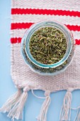 Jar of dried summer savory