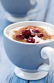 Rice pudding with cherry compote and sugar