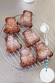 Bear-shaped carrot cakes on a cooling rack