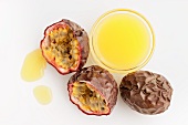 Passion fruit juice and fresh red passion fruit