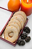 Orange sables (cookies) in a box