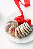 Vanilla 'ring' cookies with colored sugar sprinkles