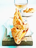 Puff pastry parcels filled with salami and cheese