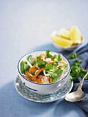 Chicken soup with coriander and rice noodles