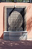 Oriental fountain with mosaic tiles