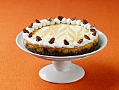 Pumpkin Marbled Cheesecake with Pecans and Gingersnap Cookie Crust