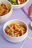 Penne with lamb and tomatoes