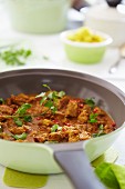 Pork curry with coriander and red pepper
