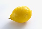 A lemon on a white surface
