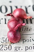 Three red onions