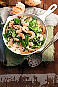 Garlic prawns and mange tout a creamy Pernod sauce