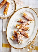 Brandy snaps filled with cream