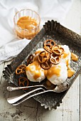 Ice cream with toffee sauce and salted pretzels