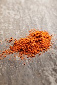 Cayenne pepper on a grey surface