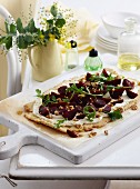 Beetroot tart with walnuts and rocket