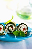 Grilled courgette rolls stuffed with sheep's cheese